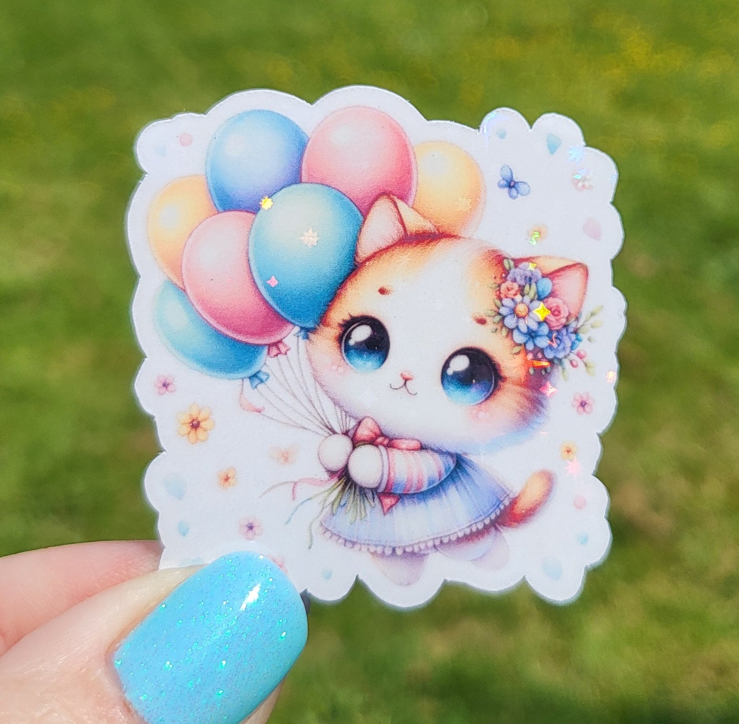 Sticker bébé chat ballon